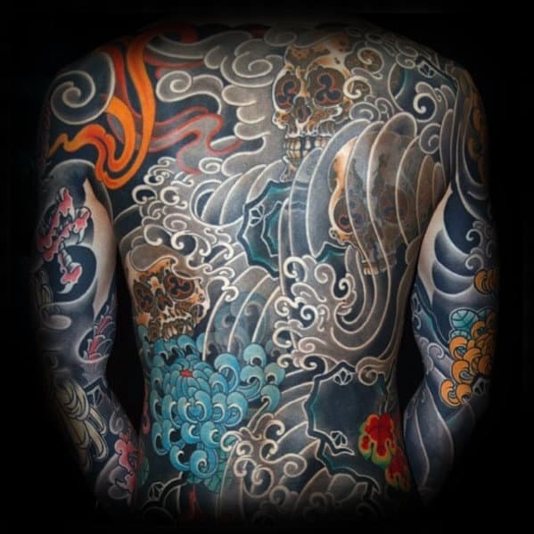 skulls-with-ocean-waves-male-japanese-full-back-tattoo